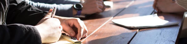 Unsplash- Hands on desk