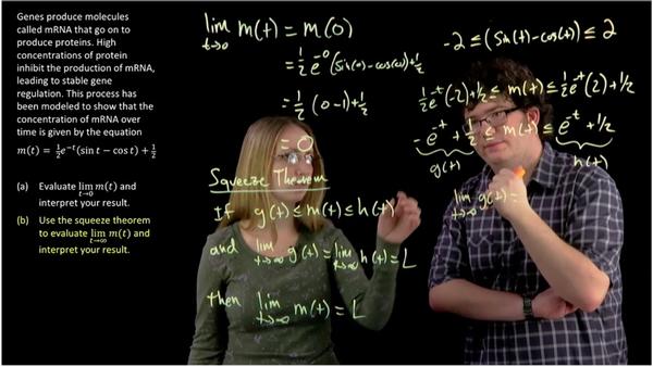 people writing equations on glass